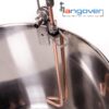 Overhead view of copper whirlpool arm on Hangover inside brew kettle.