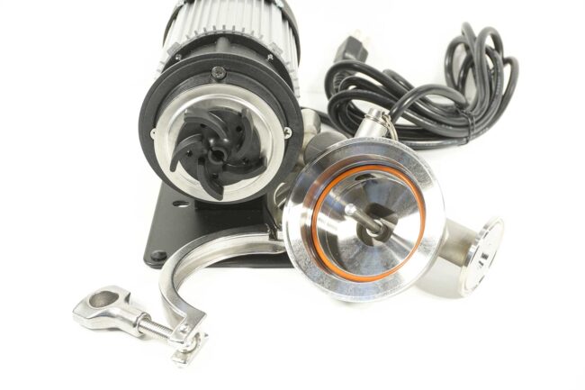 Riptide TC pump opened from the front showing the impeller, tc clamp, gasket, and housing.